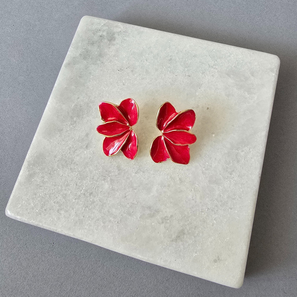 Aretes media flor coral